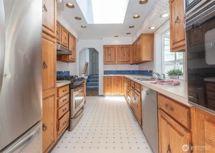 Kitchen looking to upstairs.