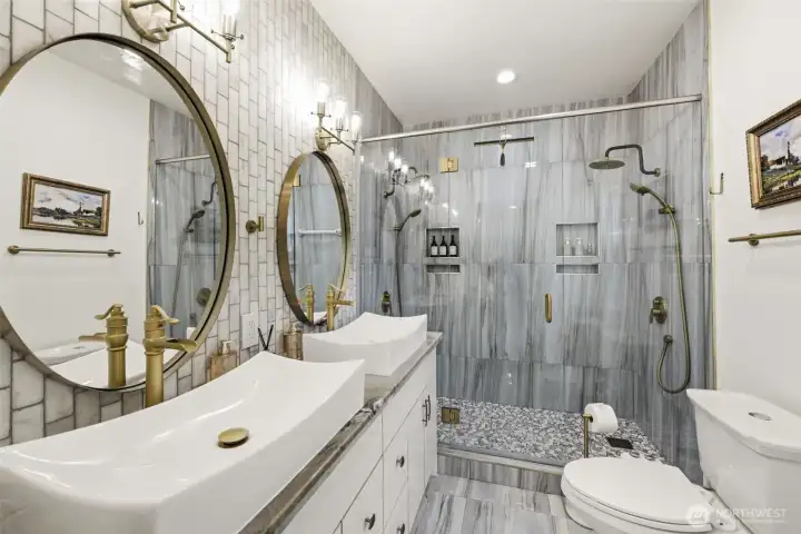 Ensuite features double vanity, heated floors and large dual shower.