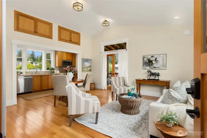 A sun-filled space with spacious Great Room and French Doors leading to a sweet balcony  on the East Side and space for a much larger dining table if you wish.