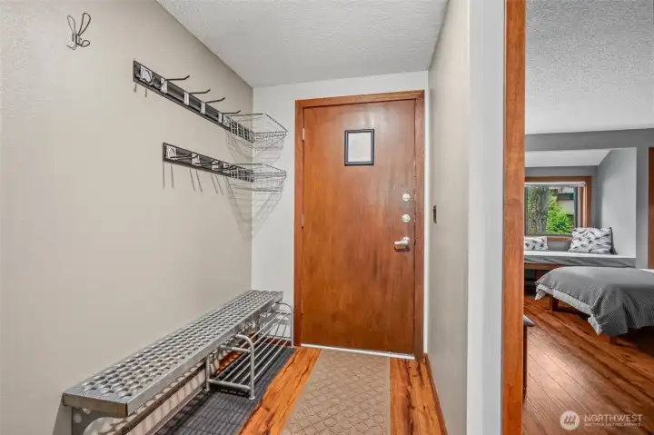 From front door, accommodates ski and other outdoor equipment.