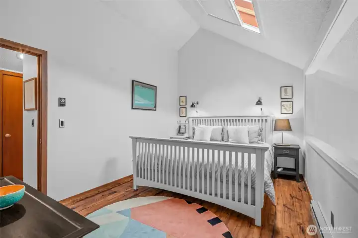 Vaulted ceiling and skylight in the upper bedroom.  Spacious closet.