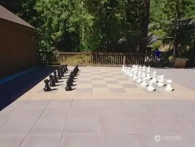 Two outdoor chess boards.