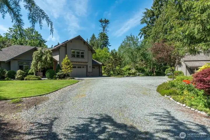 That is the shop to the right of the home.