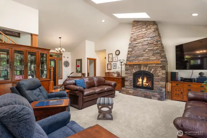 This natural gas FP is the focal point of he living room with stone all the way to the ceiling.