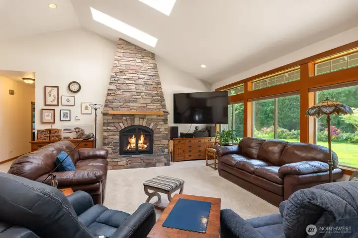 Oversized wood wrapped windows with the skylights for lots of natural light.