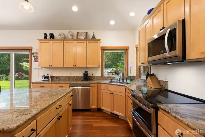 Big kitchen with granite and lots of storage and working space.