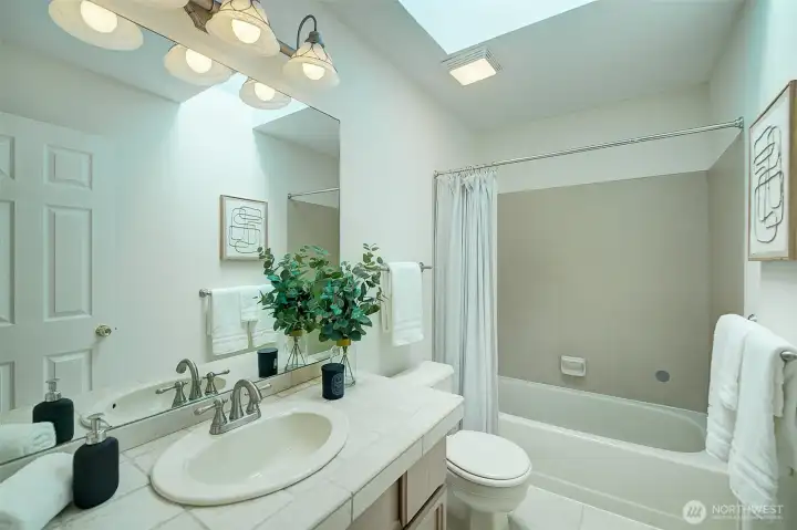 Full bath between two bedrooms upper floor