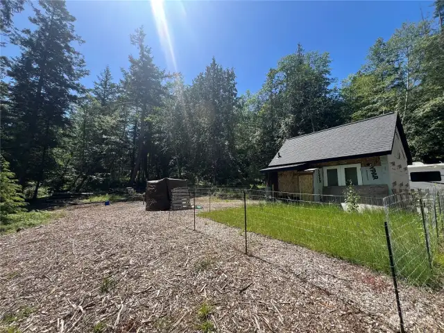 Building site is spacious with solid mature trees along property lines