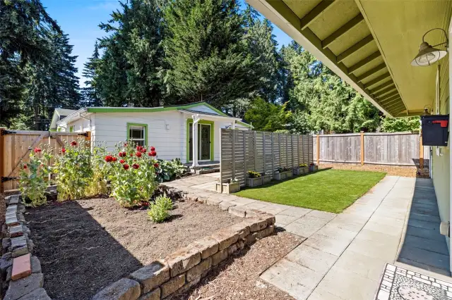 Newer fully fenced light and bright yard.