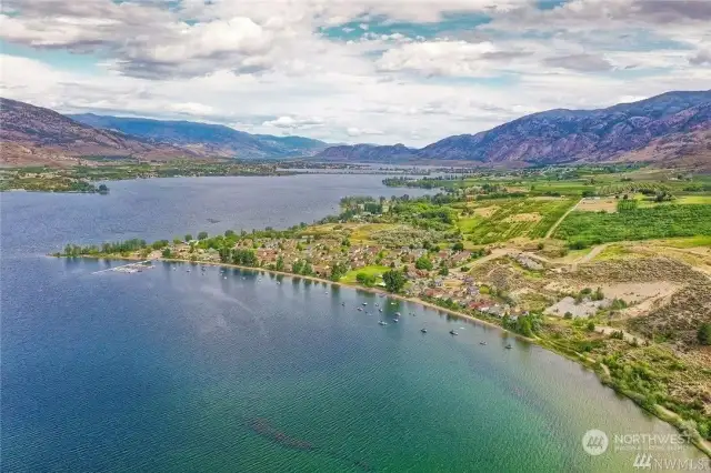 In the Sunny Okanogan Valley surrounded by the rugged hills.