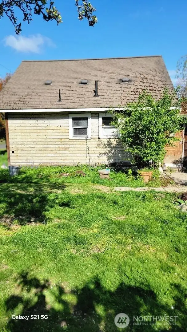 Back of home has a huge yard.
