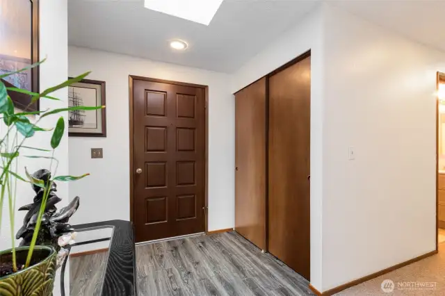 Double closets at entry, and skylight welcomes you in!