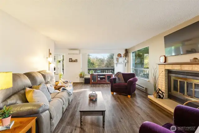 Wood burning fireplace in the spacious living room.