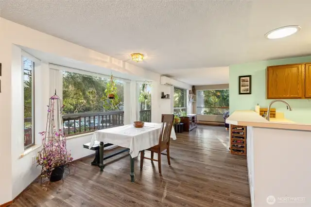 Spacious dining area has room for everyone to come over on Thanksgiving, or host dinner parties!