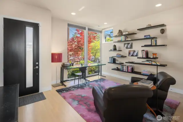 The main floor den is just one of two, fantastic home office spaces with peaceful, arboreal outlooks
