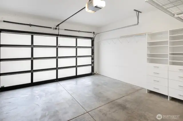 A real 2-car garage includes storage space, above and aside