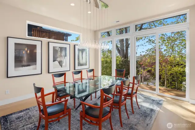 A formal Dining Room with gallery wall space is just steps from, both, the kitchen and the outdoors