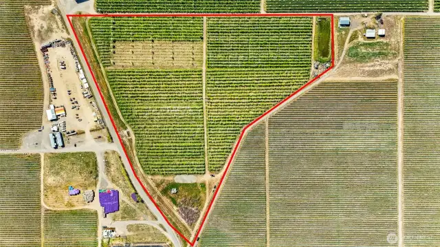 The orchard and irrigation pond are in the red outline.