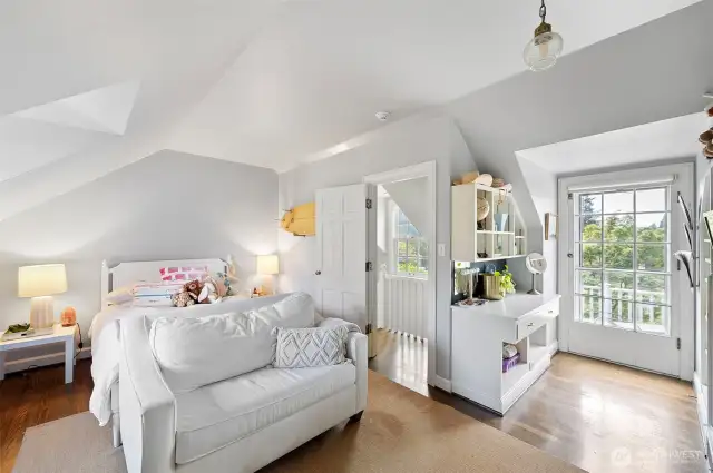 3rd Bedroom with built-in and a private balcony.