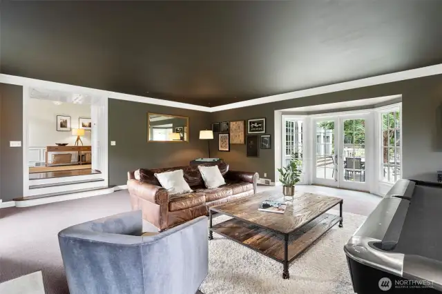 Spacious Living/Family Room- plenty of arrangement options, french doors lead to the back gardens.