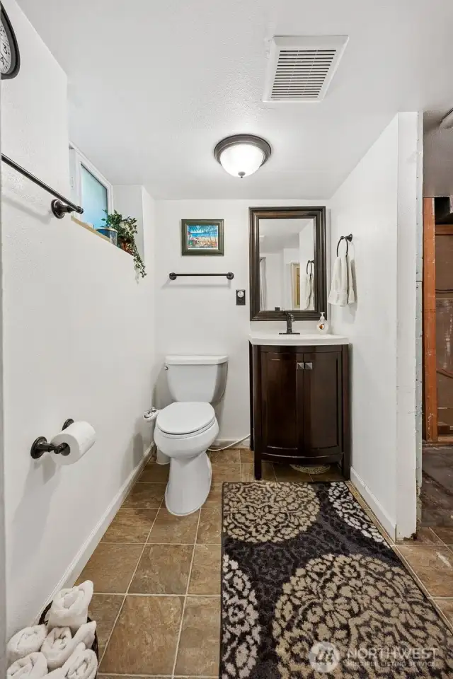 Primary bedroom ensuite 1/2 bath with roughed-in shower