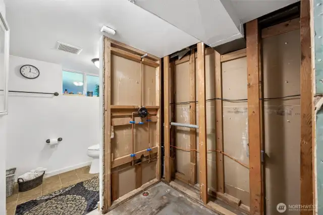 Primary bedroom rough-in for shower/cabinet