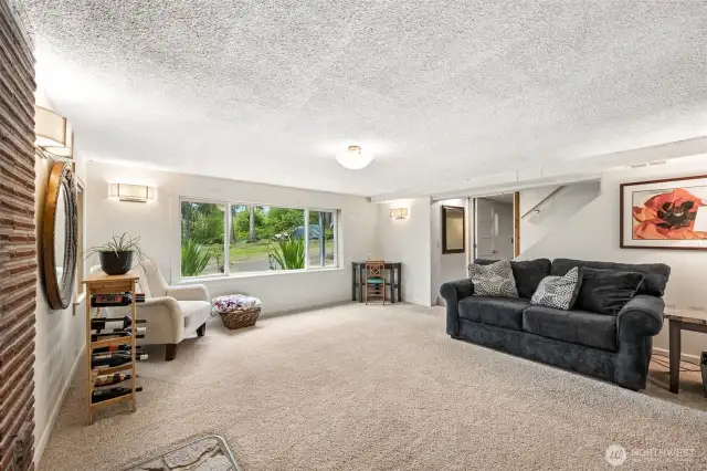 Family room wonderful large windows bring in light and a great view