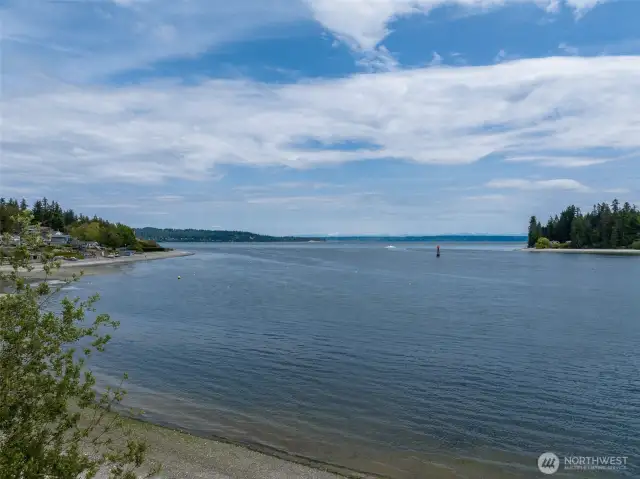 Views from Old Man Beach Access. Boat traffic passing through Agate Passage, views to Bainbridge Island and the Seattle skyline.