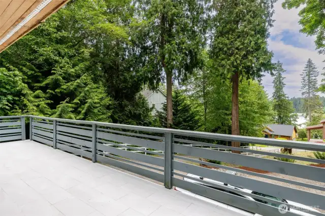 Expansive southern-facing deck that highlights peek-a-boo views of Agate Passage.