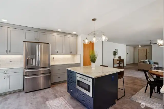 Coffee bar fits perfectly next to the fridge and the island has a GORGEOUS granite top