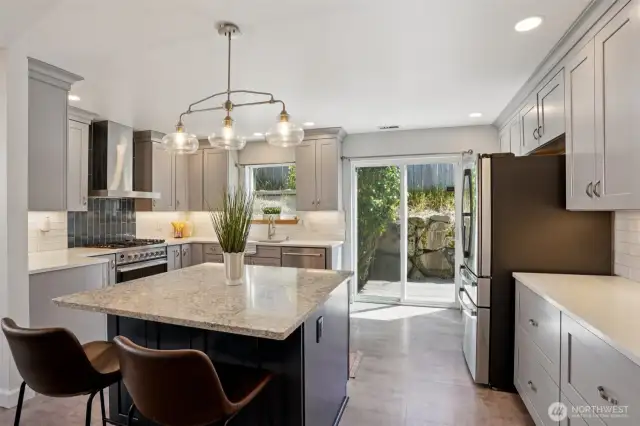 I can't say enough about this custom kitchen. Beautiful shaker cabinets, Fisher&Paykel range, drawer microwave, it's all brand new and ready for you