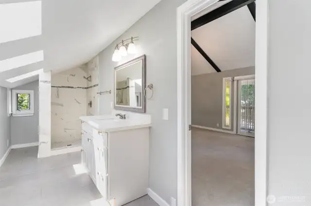 Upstairs primary ensuite with beautiful finishes.