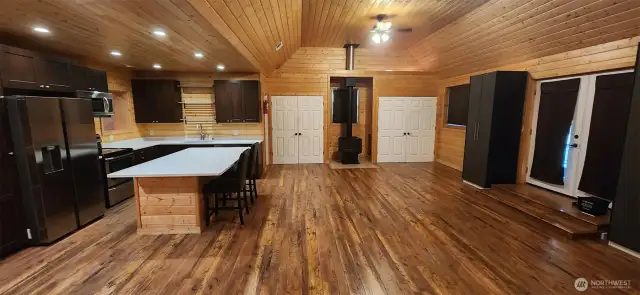Custom vaulted ceiling offers loads of storage as well as beauty