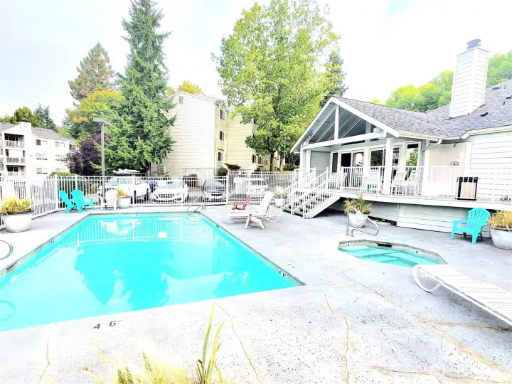Amenities include outdoor pool, hot tub gym and clubhouse.