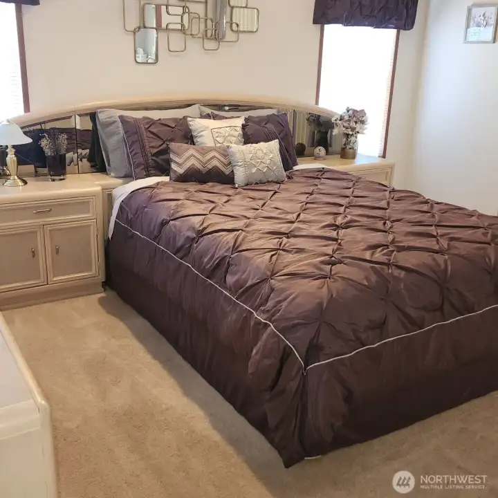 Primary bedroom with walk in closet.