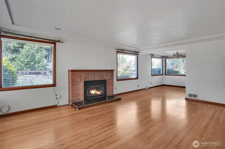 Living and dining room with great picture windows!