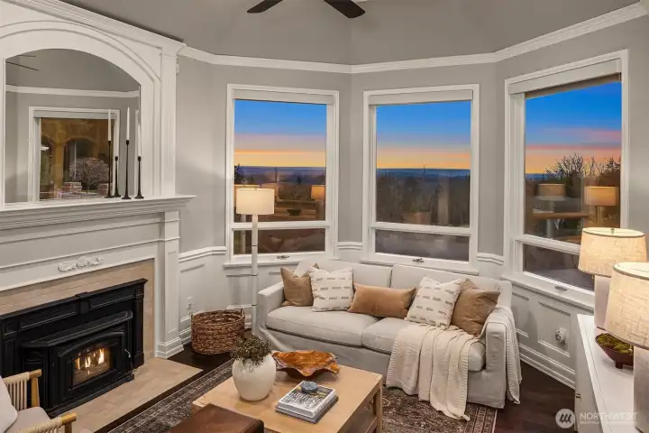 The formal living room has a wood burning fireplace insert.