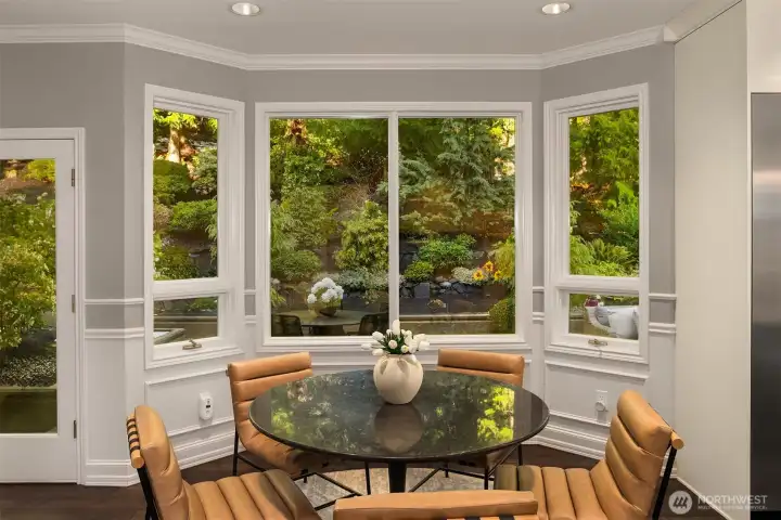 The dining area off the kitchen feels like eating in the garden, which is also an option on the back patio!