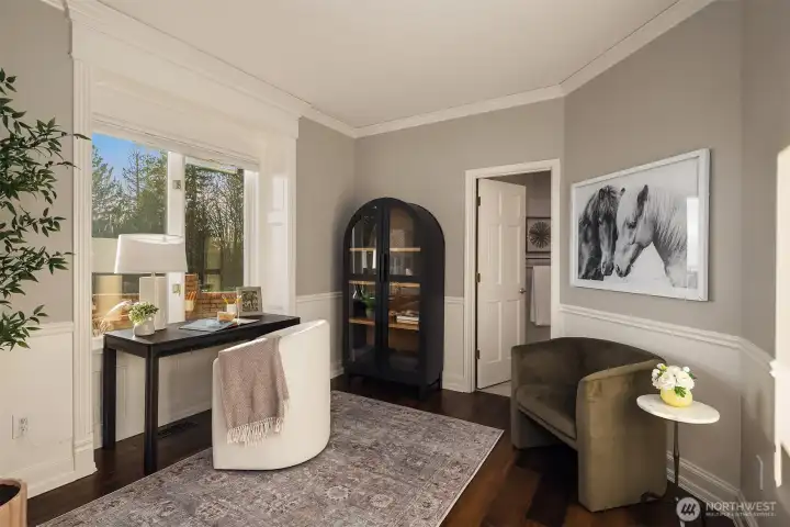 Bedroom #4 / guest suite / additional den is on the main floor and has an attached bathroom with a shower.