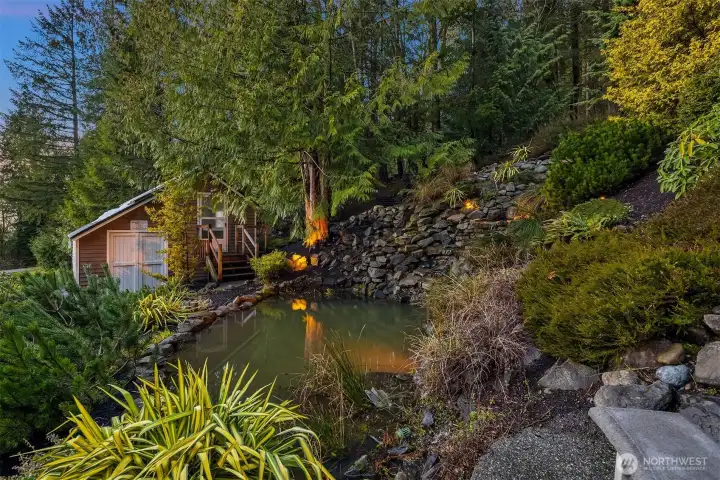 The greenhouse has plumbing, electricity and a fan. There is a storage room beneath it to house all of the gardening tools and supplies.