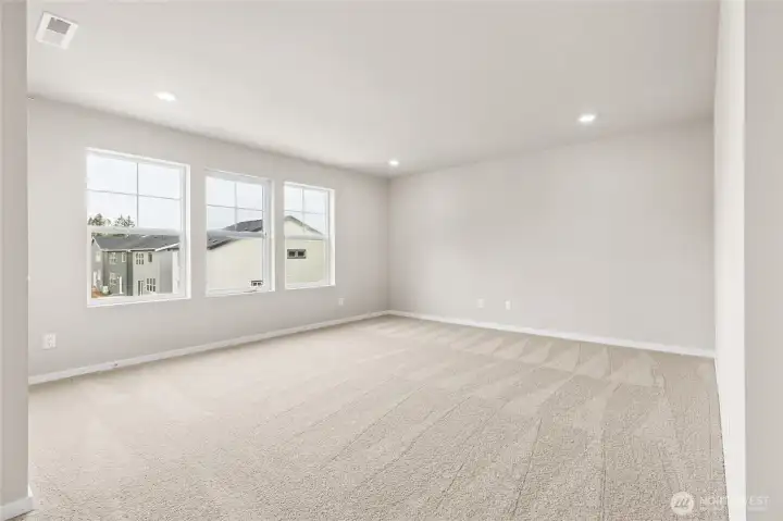 Spacious primary bedroom. Photos are representative only and may display different color packages and/or upgrades.