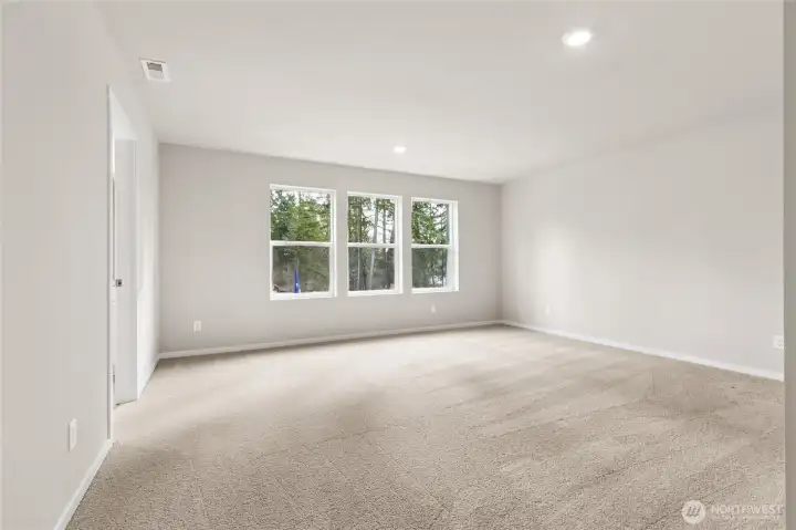 Primary bedroom at the back of the home for the best views. Photos are representative only and may display different color packages and/or upgrades.