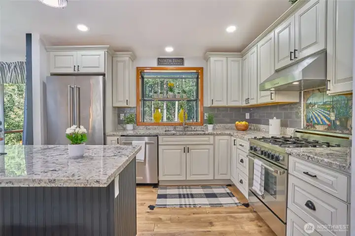 High-end stainless-steel appliances elevate the kitchen’s modern feel—and they’re all included!