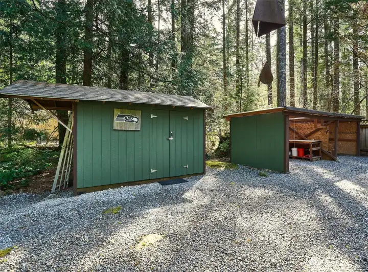Two large outbuildings provide abundant room for all your outdoor tools, equipment, and gardening essentials—ideal for keeping everything organized and easily accessible.