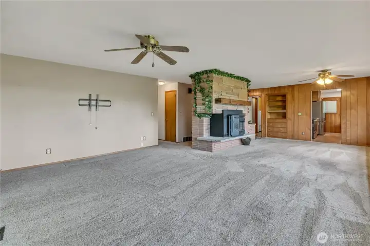 Spacious main living area with ceiling fans