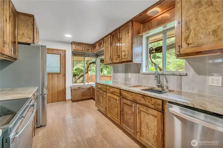 Breakfast nook off dining room with door to the covered patio