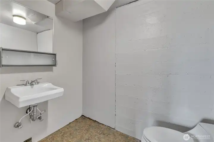 Additional 1/2 bath downstairs for the shop