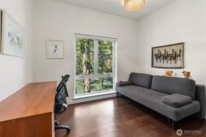 The third bedroom also has stunning views of the river and outdoors. What a perfect way to relax as you fade to sleep.  And both of the additional bedrooms are on the opposite end end of the house from the primary bedroom which provides as much privacy possible.