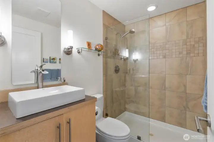 Full bath is directly outside the 2nd & 3rd bedrooms.