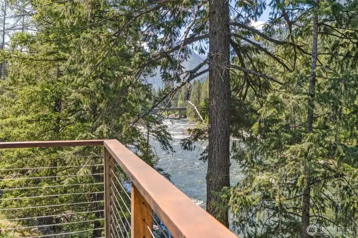 The primary bedroom with ensuite and private deck with it's own hot tub!